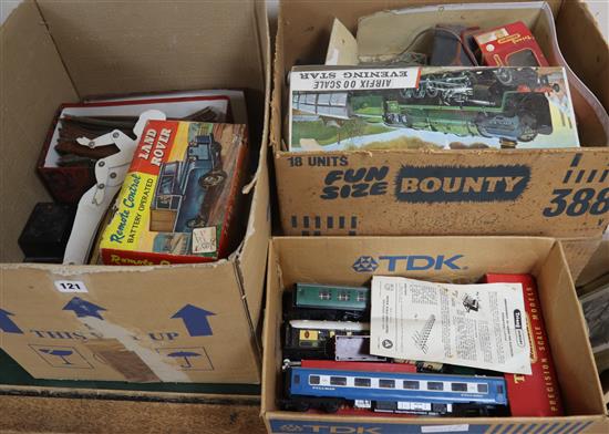 A quantity of Hornby Tri-Ang and other 00 gauge wagons and track, early Scalextric, games, etc.